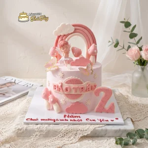 Bánh kem màu hồng thôi nôi cho bé gái